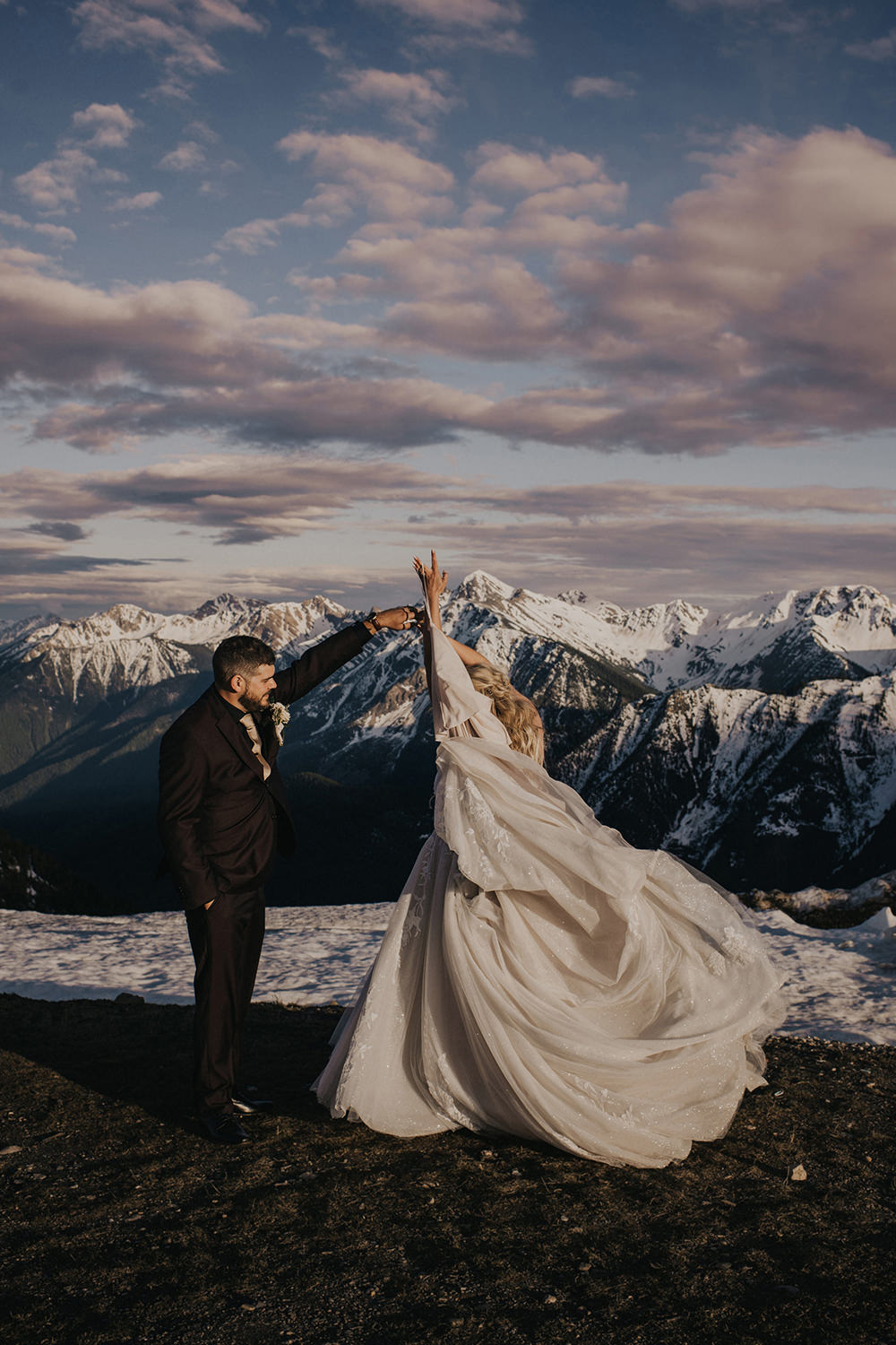 Dancing wedding photo on the top of Kicking horse mountain