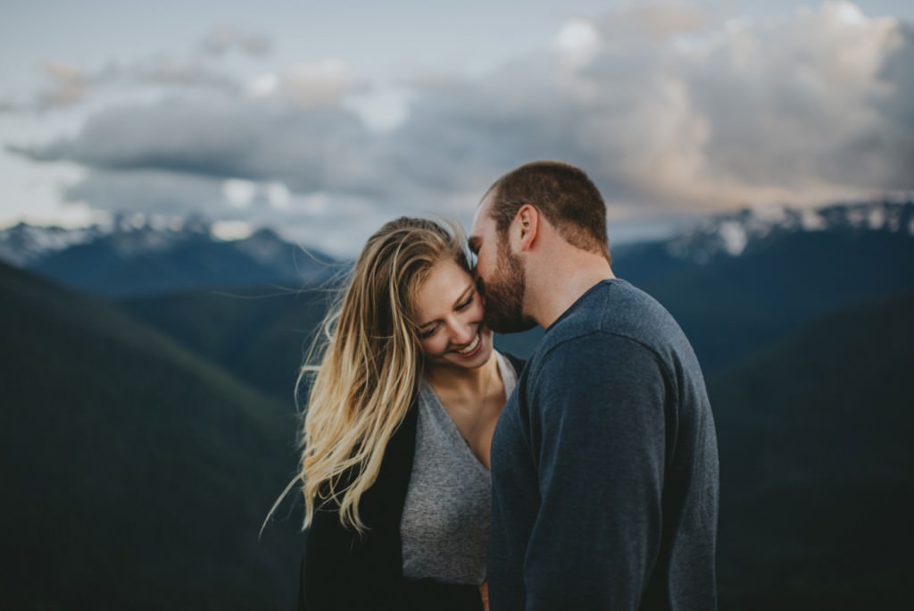 Lovely couple engaged on mountain